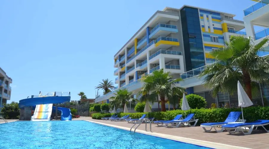 200M FROM THE BEACH 1+1 FLAT IN A FULL FACILITY COMPLEX IN KESTEL 