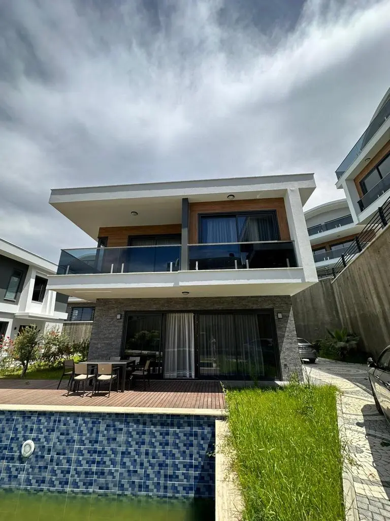 FURNISHED 3+1 VILLA IN A VILLA SITE WITH SECURITY AND PRIVATE POOL